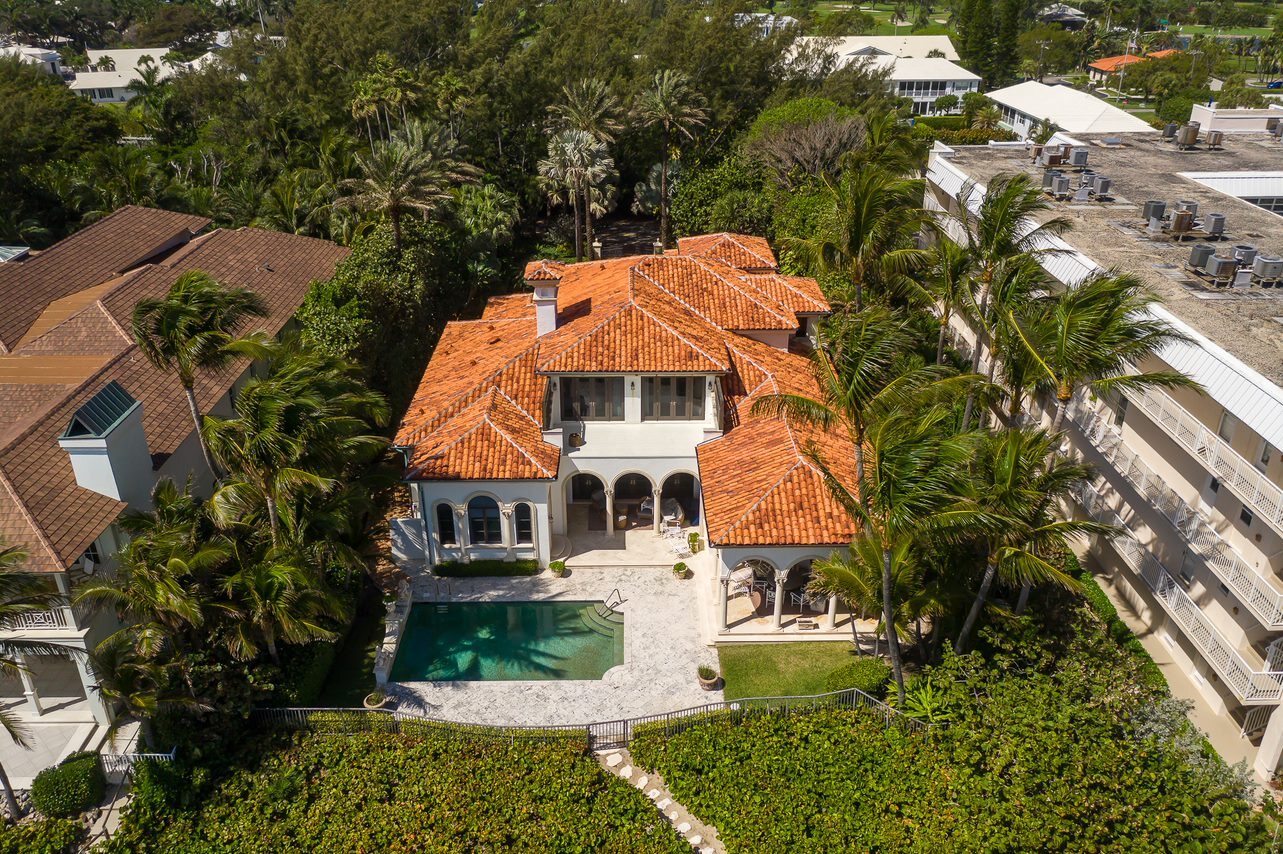 Completed terracotta tile roof on a South Florida waterfront home.