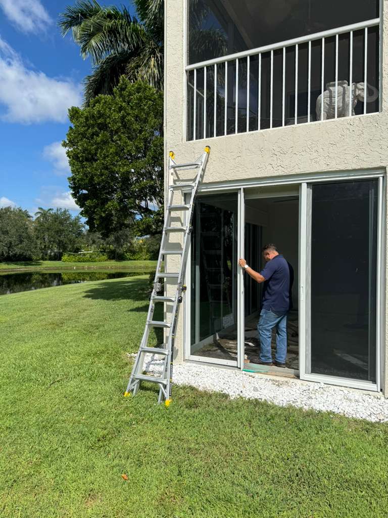 Impact-window and sliding-door installation in progress.